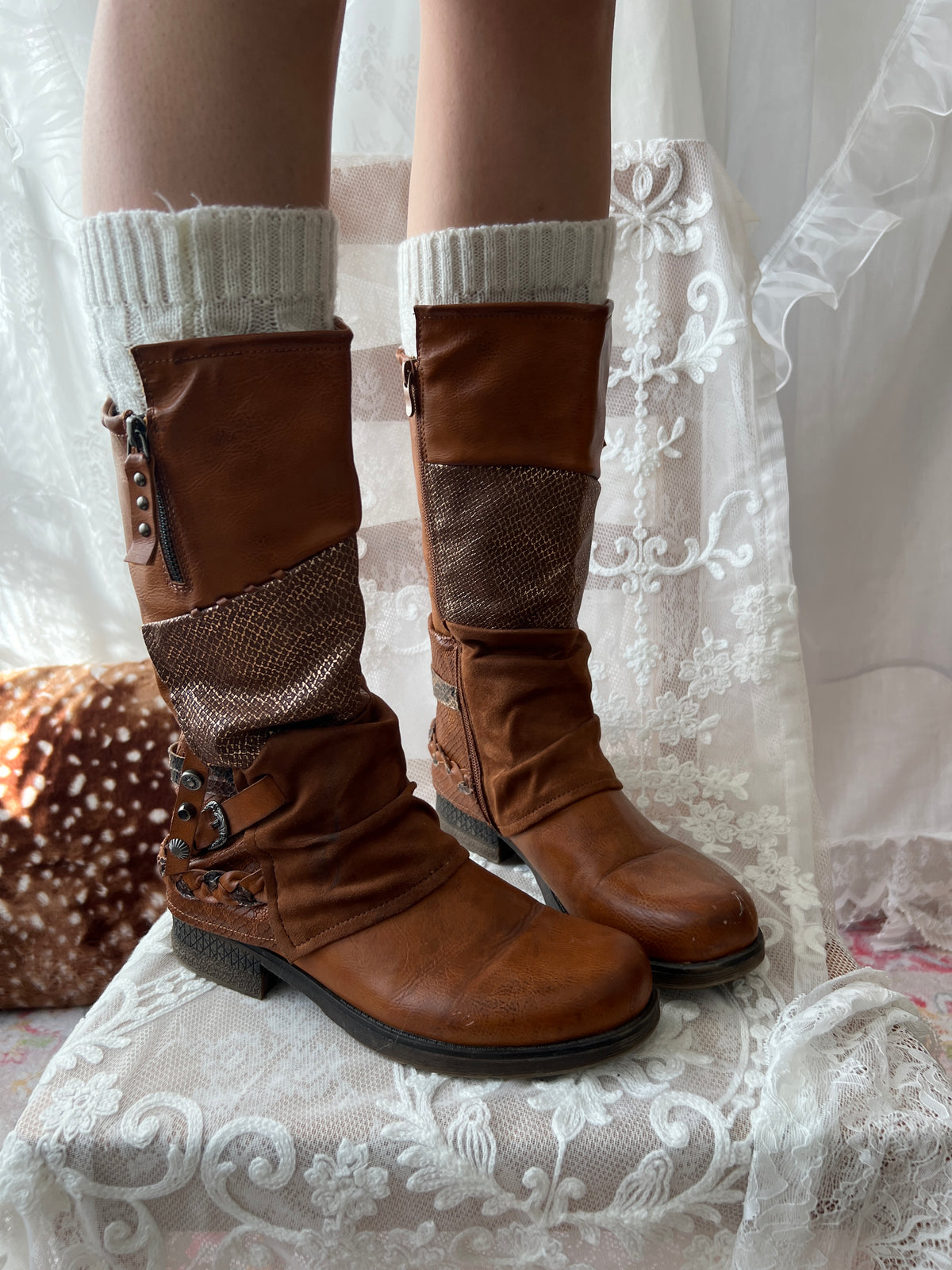 Brown boots with snake skin pattern