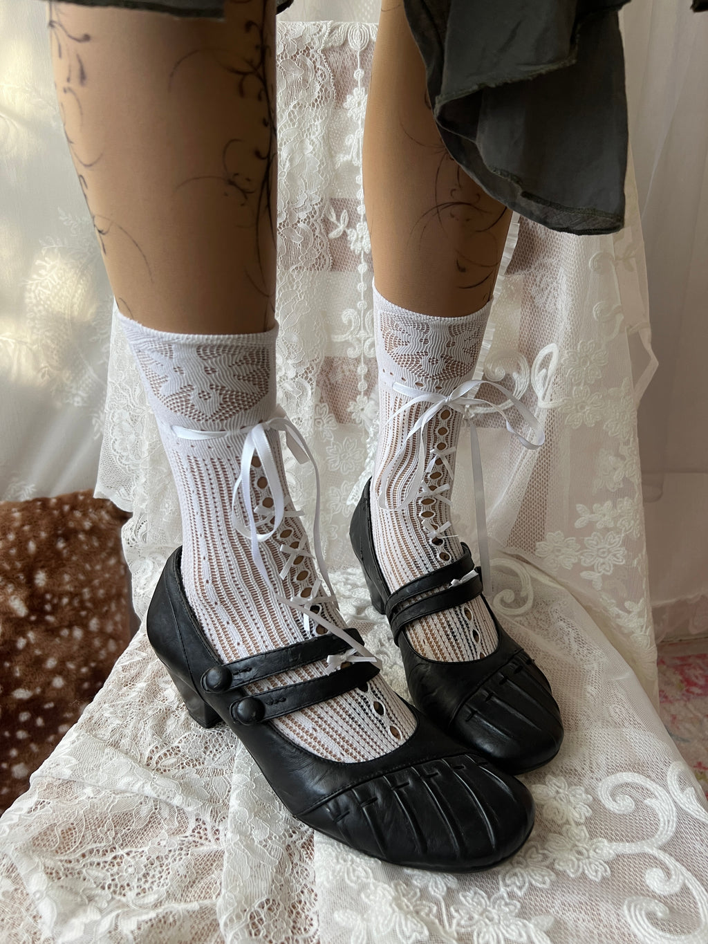 Black Mary Jane shoes with button detail