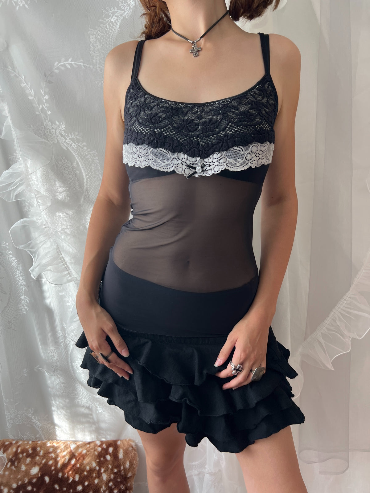 Black lace cami top with white lace trim and bow detail