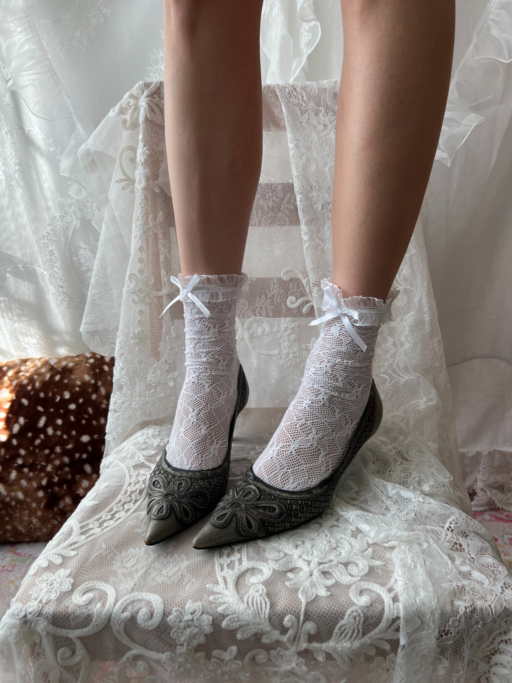 Grey snake skin kitten heels with flower detail