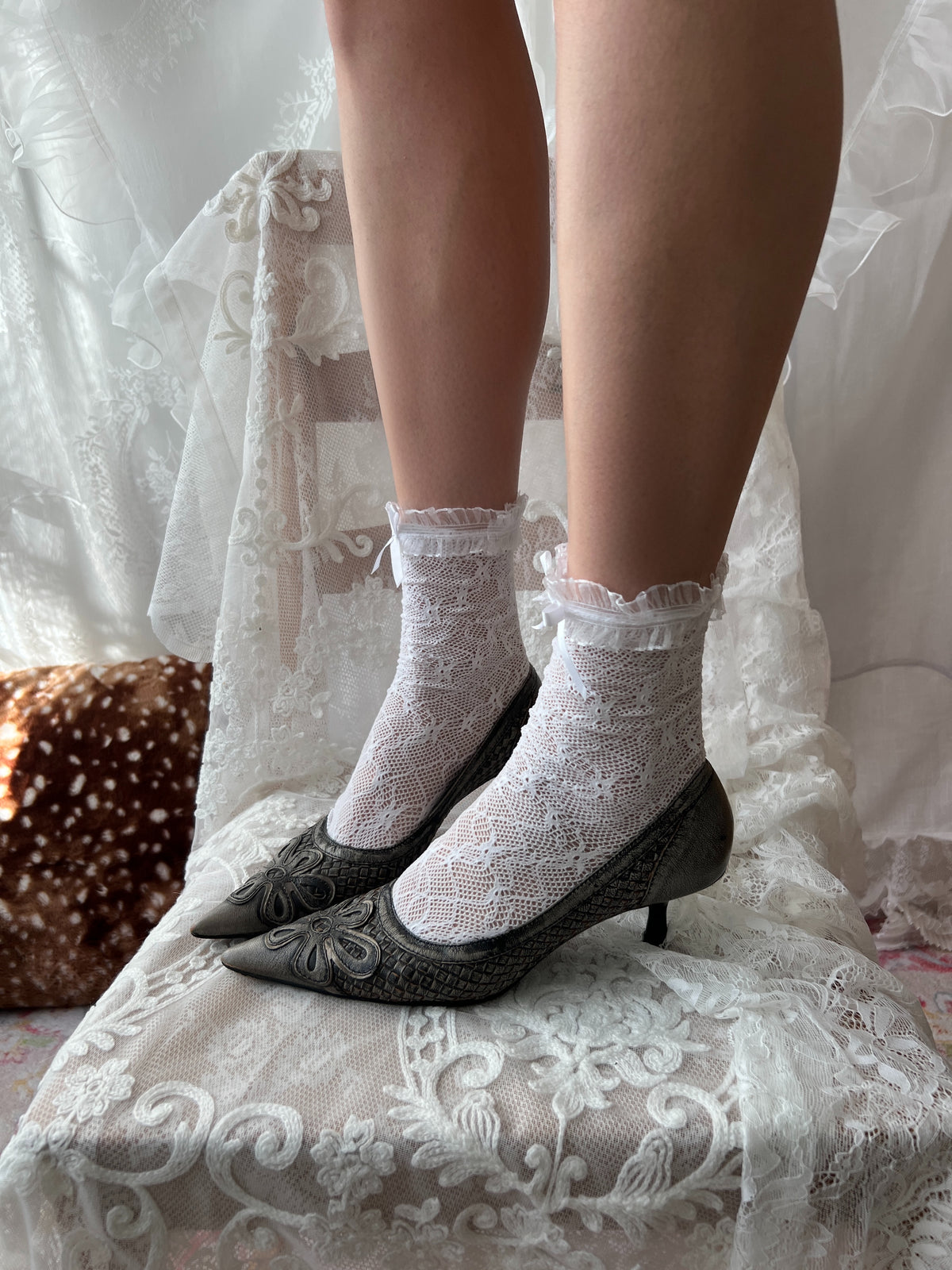 Grey snake skin kitten heels with flower detail