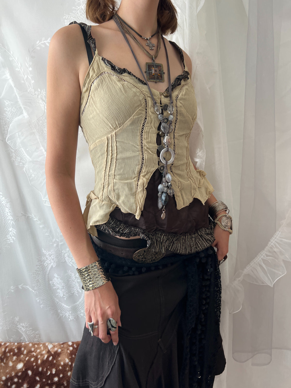 Cream & brown layered asymmetrical corset top with ruffles and lace details