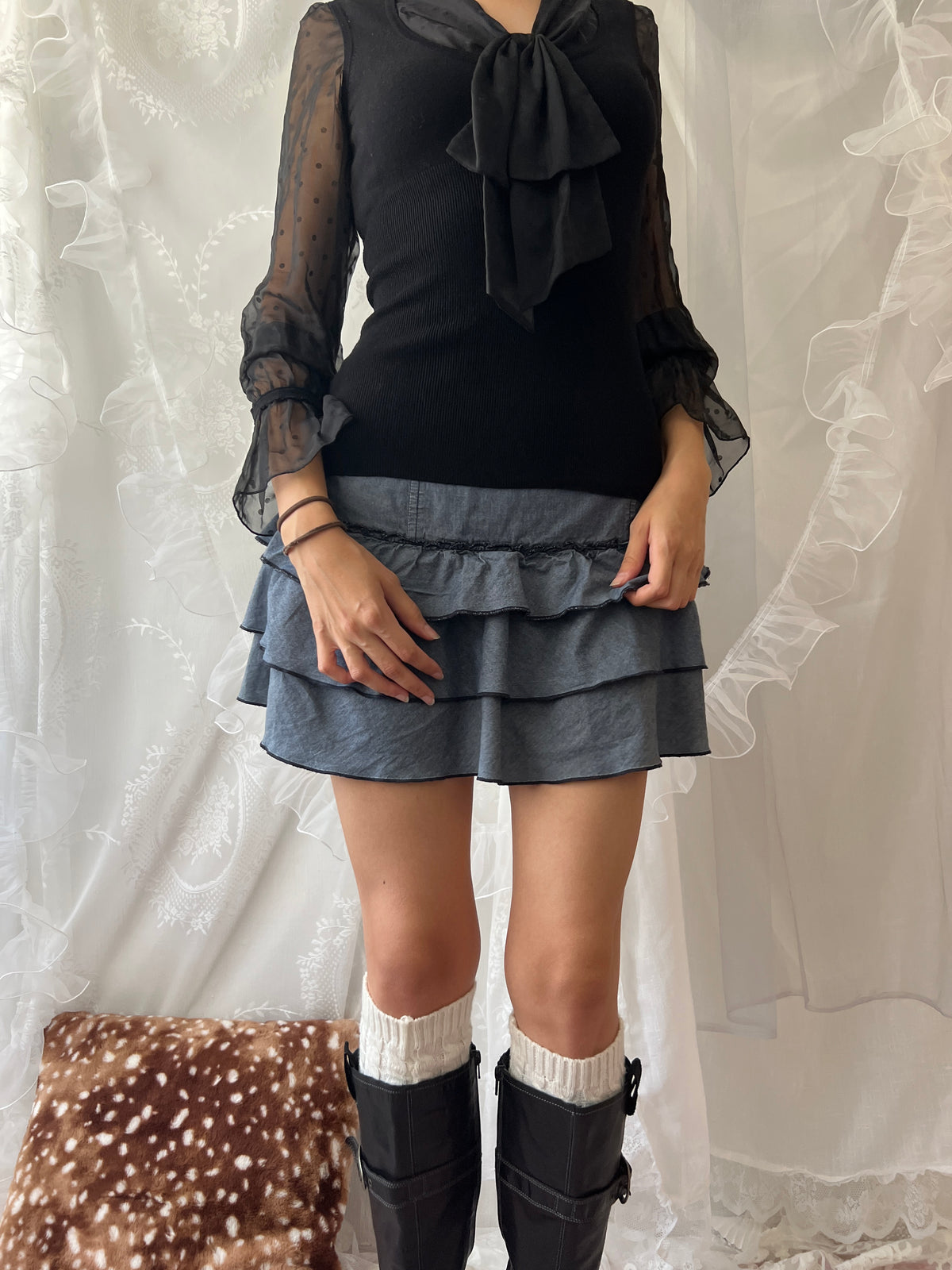 Blue ruffle layered mini skirt with buttons on both sides