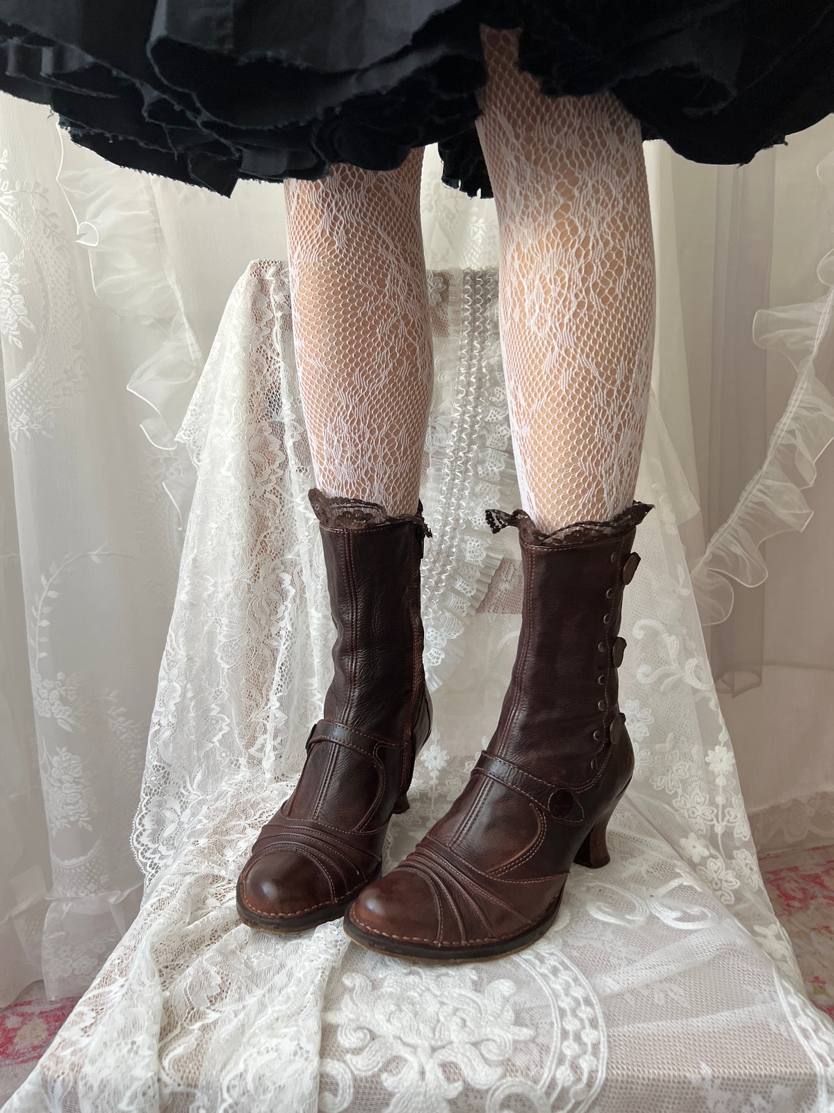 Brown Art leather lace up boots with a gothic vibe