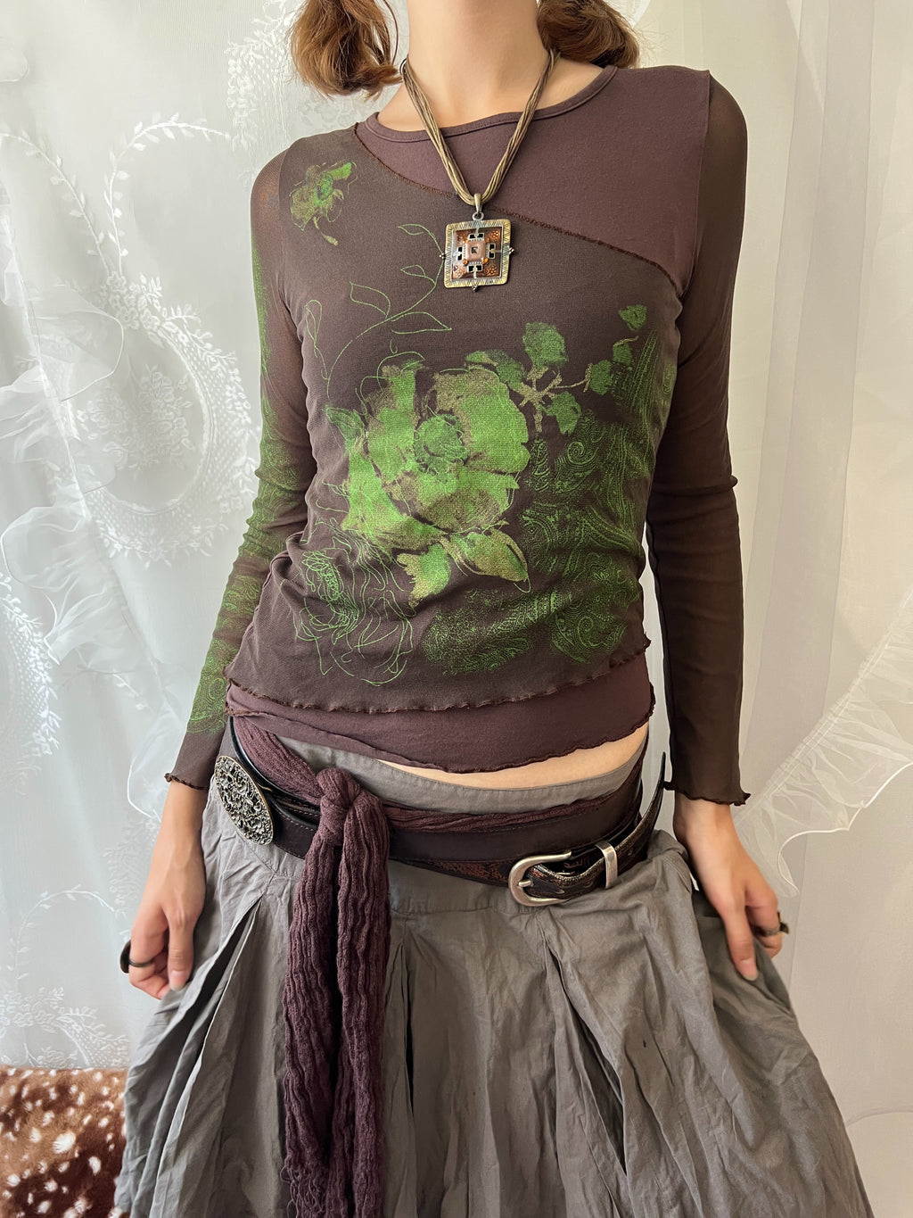 Brown sheer mesh long sleeve top with green floral design