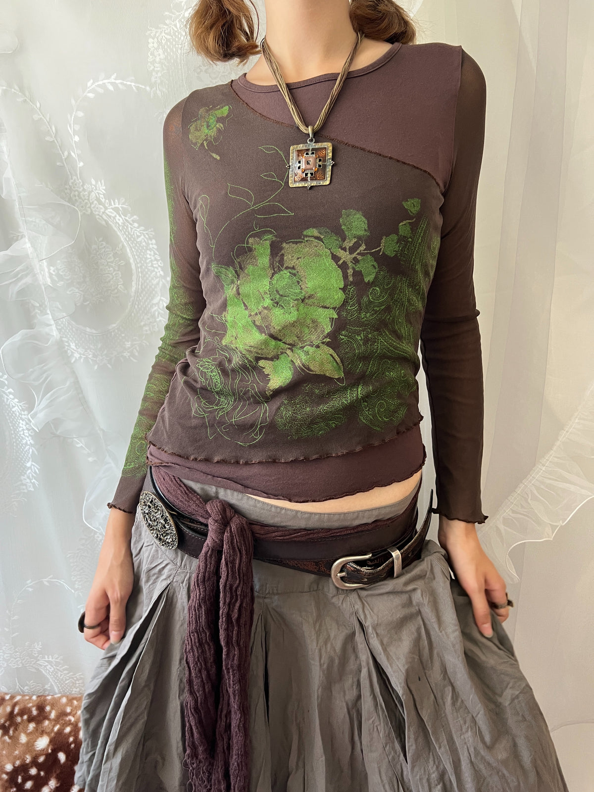 Brown sheer mesh long sleeve top with green floral design