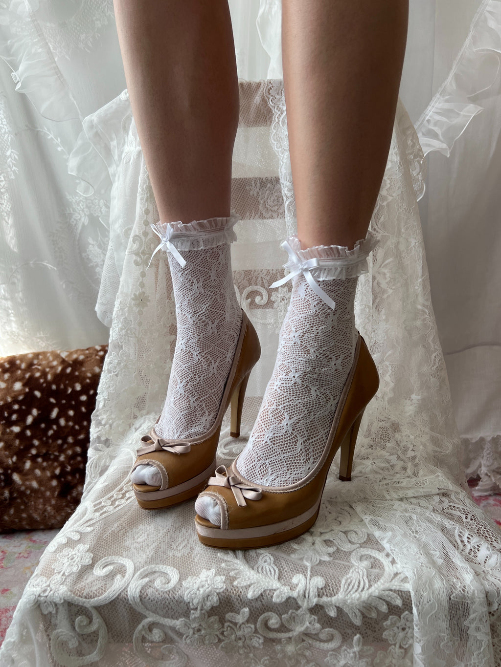 Tan peep toe heels with bow