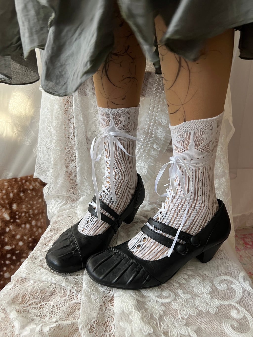 Black Mary Jane shoes with button detail