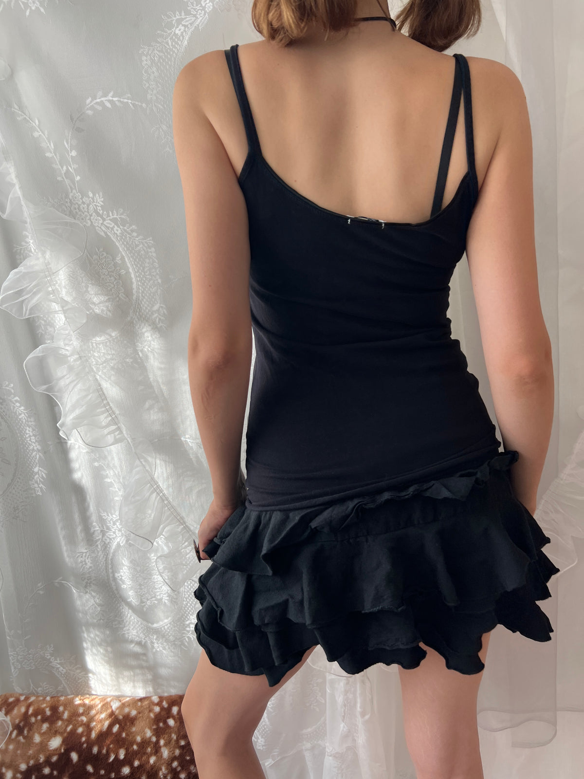 Black lace cami top with white lace trim and bow detail
