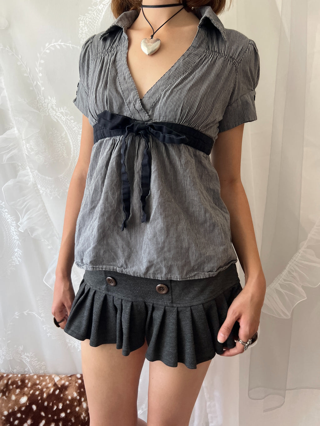 Grey pinstriped belted blouse with black ribbon tie