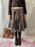 Brown pleated midi skirt with ruffle trim