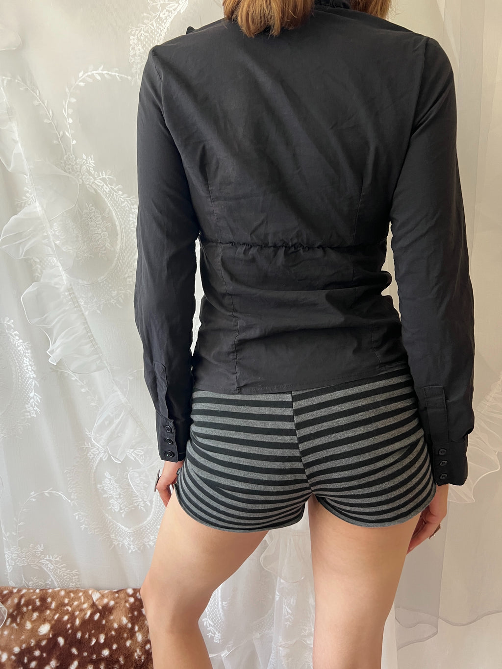 Black ruffle blouse with button up front and long sleeves
