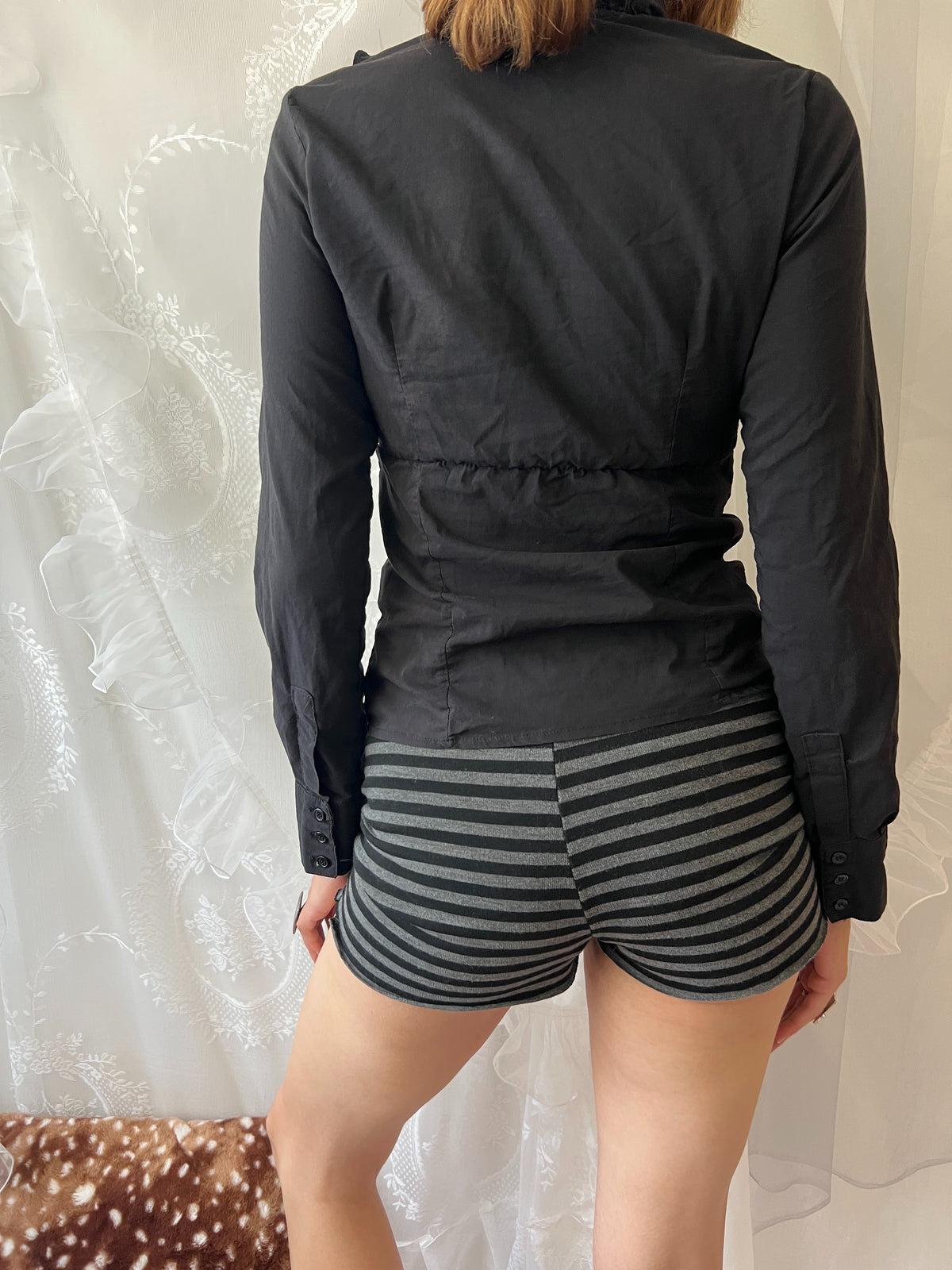 Black ruffle blouse with button up front and long sleeves