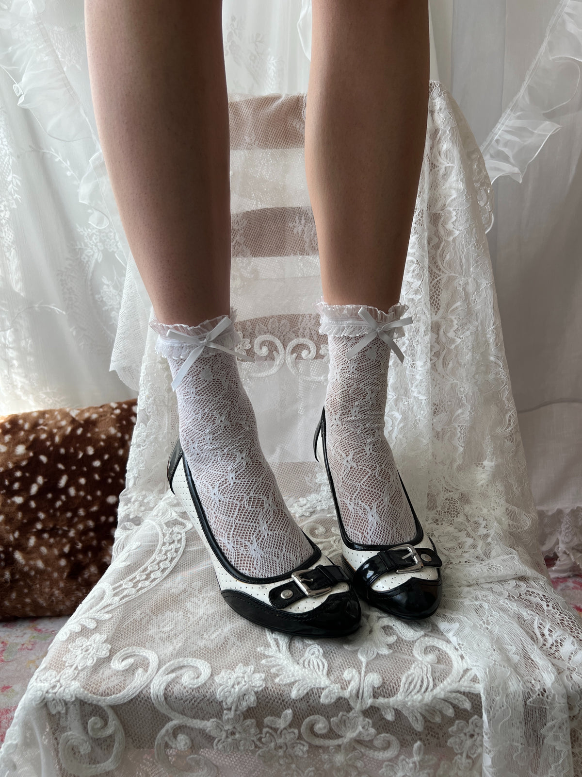 Black and white polka dot heels with buckle detail