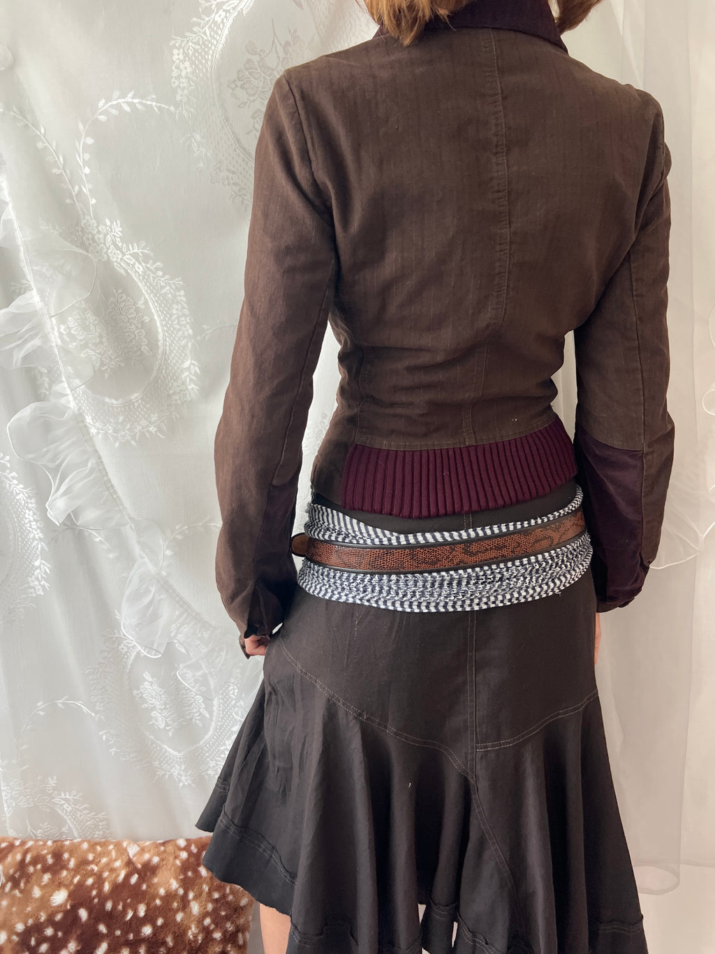 Brown double buttoned asymmetrical avant garde jacket