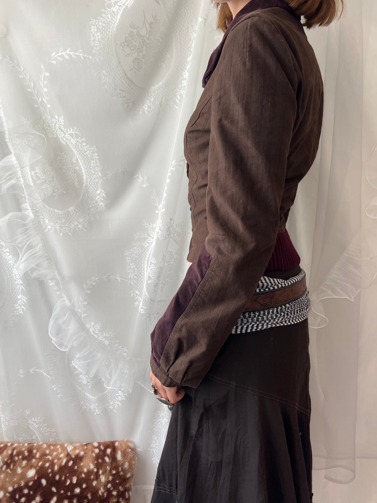 Brown double buttoned asymmetrical avant garde jacket