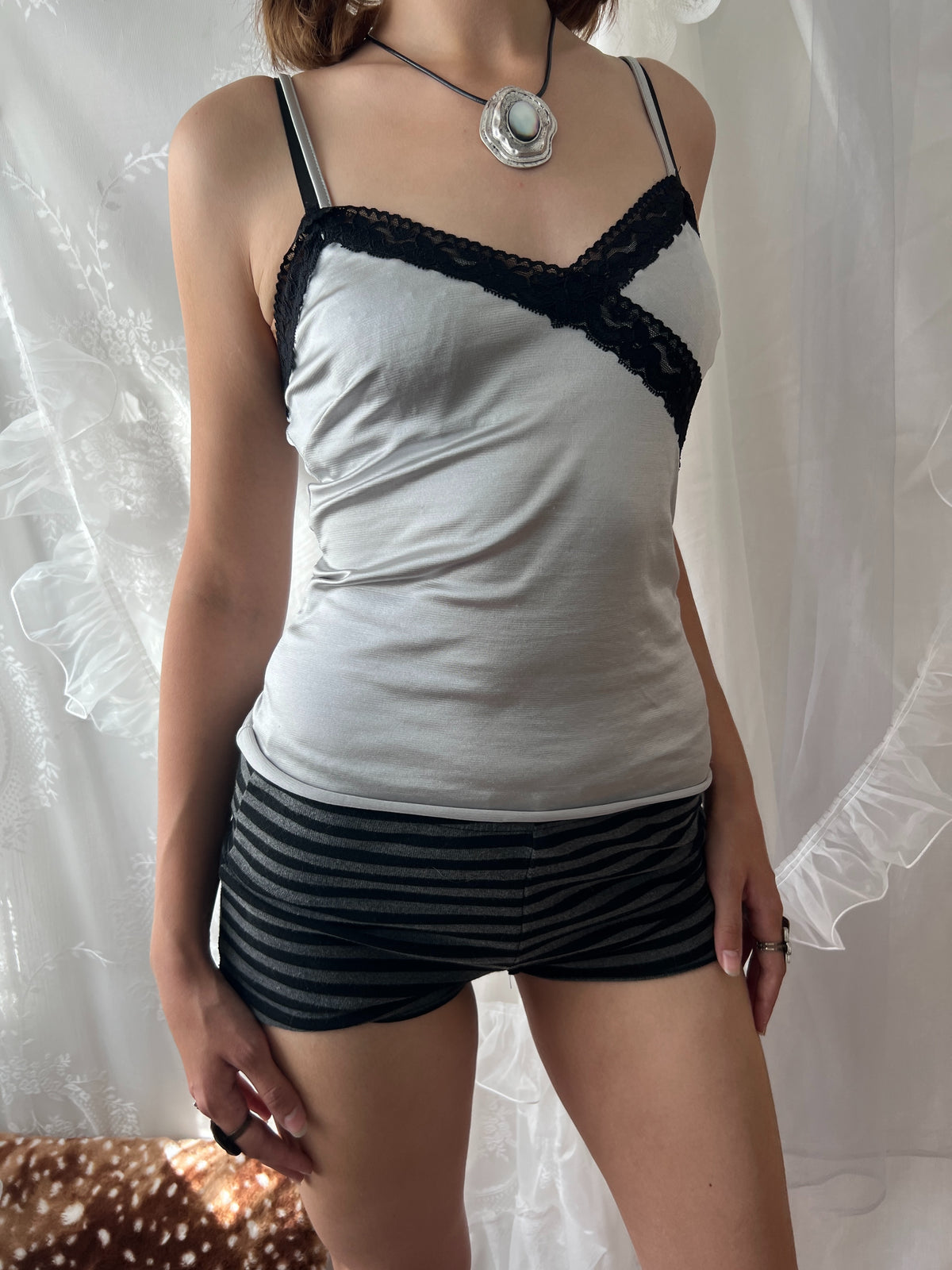 Black lace silver cami top with adjustable straps and tie detail