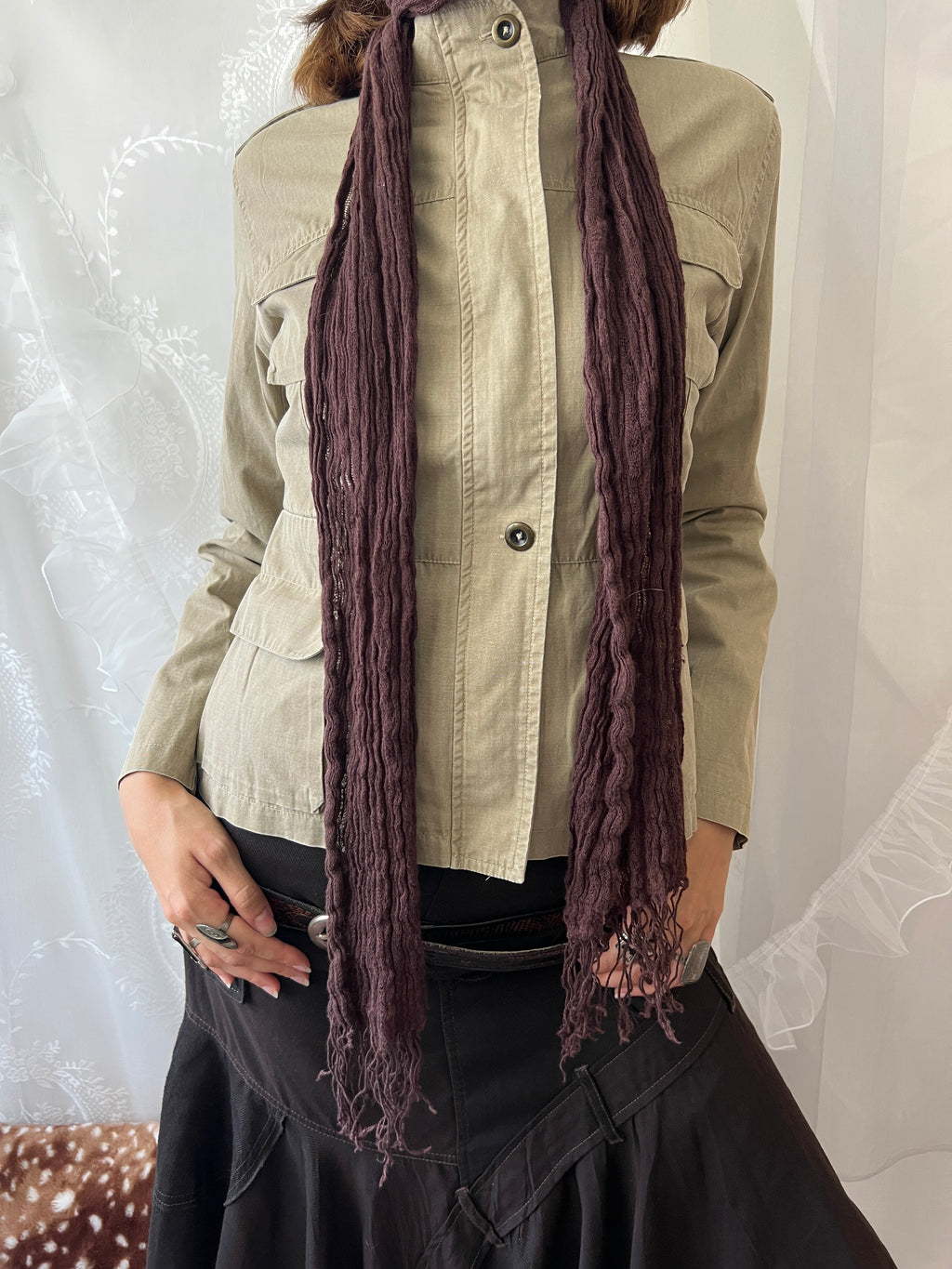 Khaki beige jacket with pockets, a zipper and a button-up front
