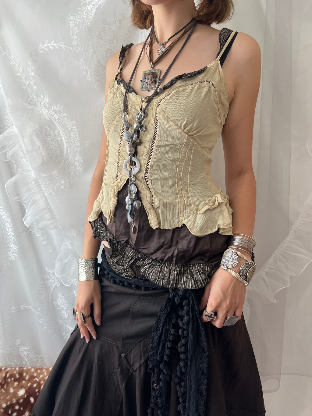 Cream & brown layered asymmetrical corset top with ruffles and lace details