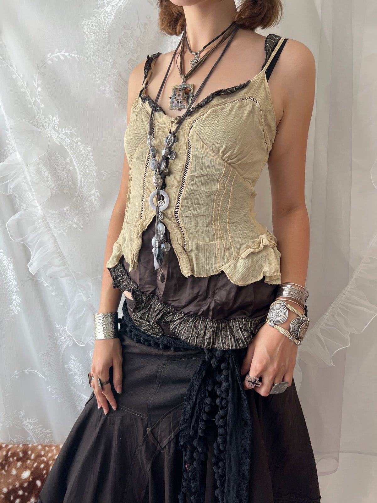 Cream & brown layered asymmetrical corset top with ruffles and lace details