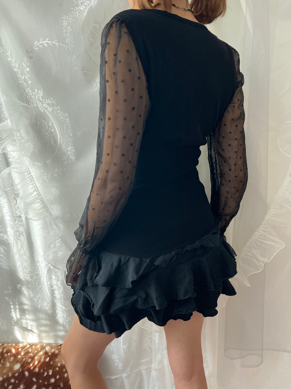 Black sheer polka dot blouse with bow detail