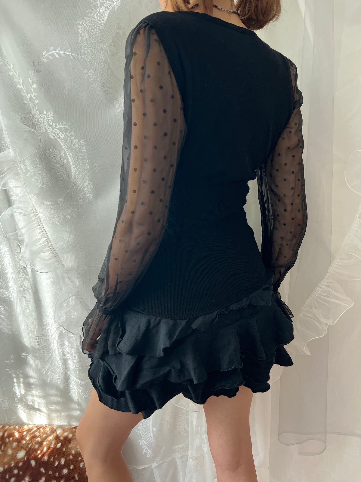 Black sheer polka dot blouse with bow detail