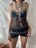 Black lace cami top with sheer mesh overlay and adjustable straps