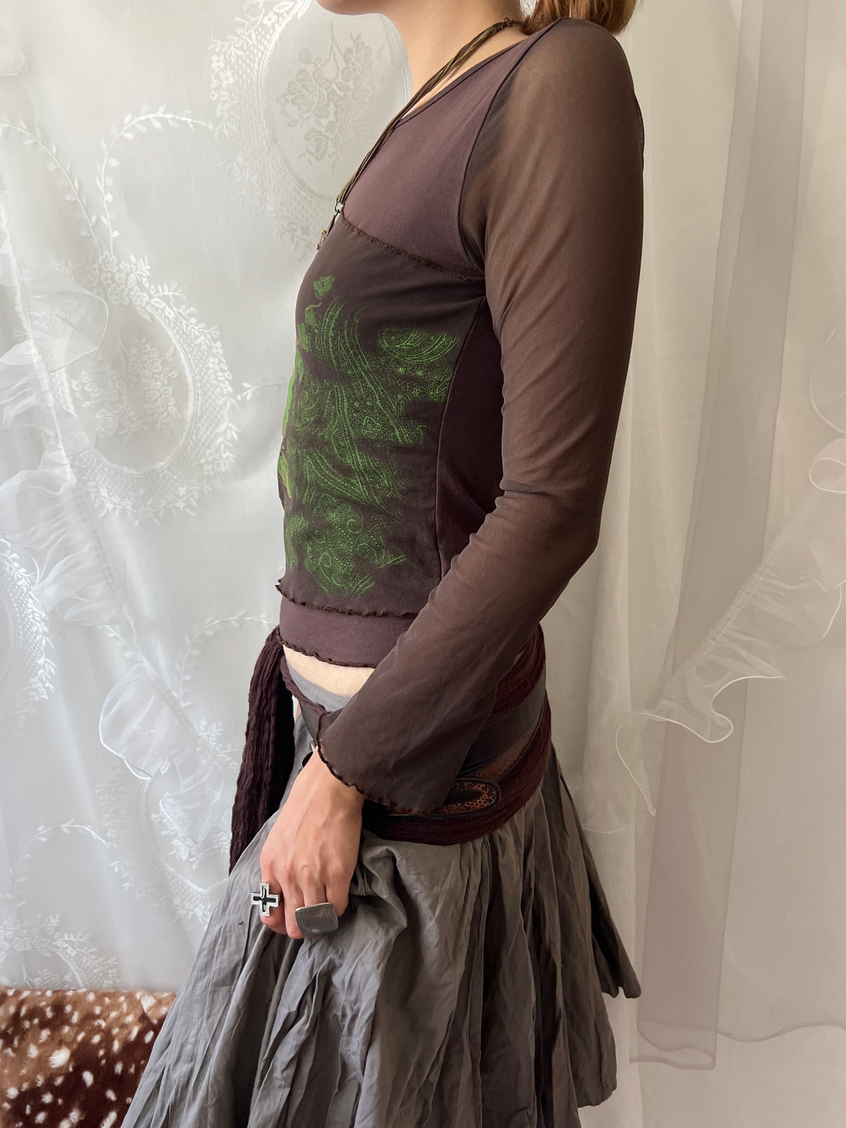 Brown sheer mesh long sleeve top with green floral design