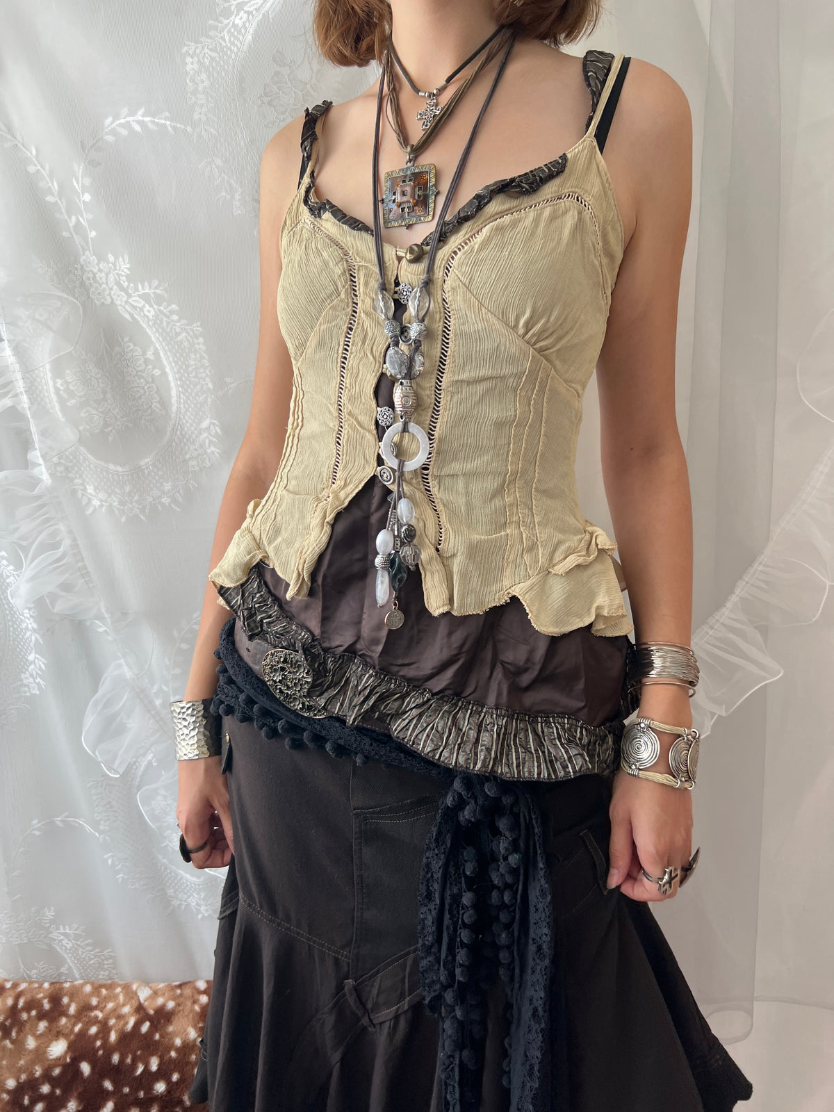 Cream & brown layered asymmetrical corset top with ruffles and lace details