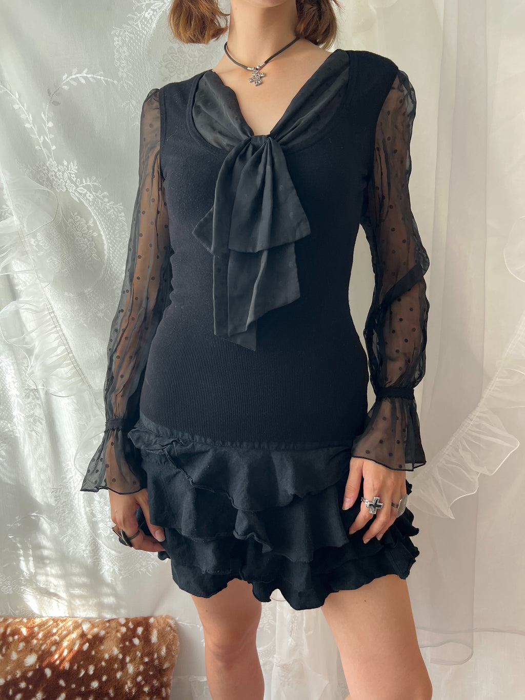 Black sheer polka dot blouse with bow detail